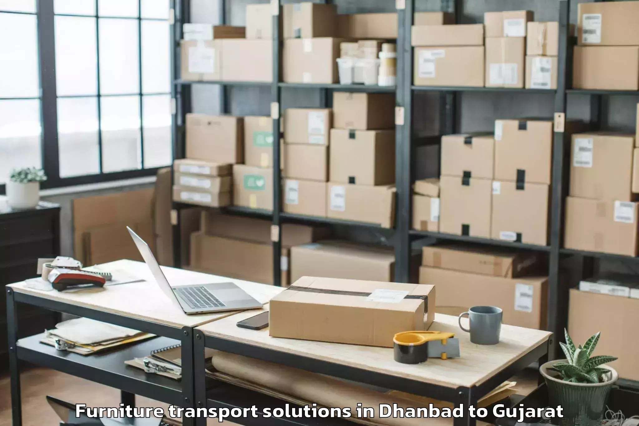 Expert Dhanbad to Kamrej Furniture Transport Solutions